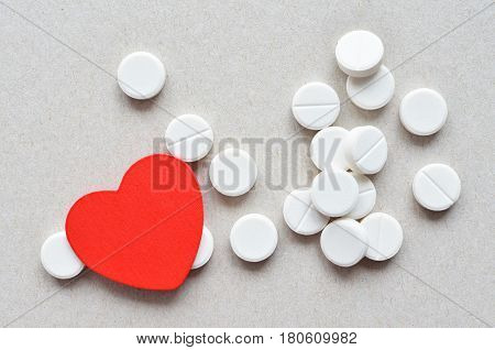 White Tablets With Red Heart
