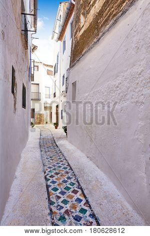 Chelva village street in Valencia of Spain Mediterranean whitewashed walls