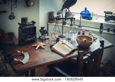 Grodno, Belarus - April 5, 2017: Apothecary Table With Drugs And Vintage Equipment In The Pharmacy M