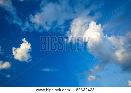 The clouds is blue color at the sky.