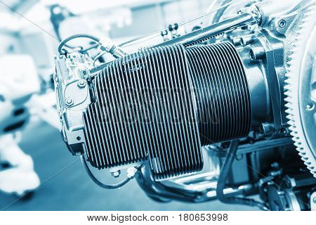 Detail view on the Piece of equipment of the aircraft engine closeup a aircraft engine detail. Blue colored
