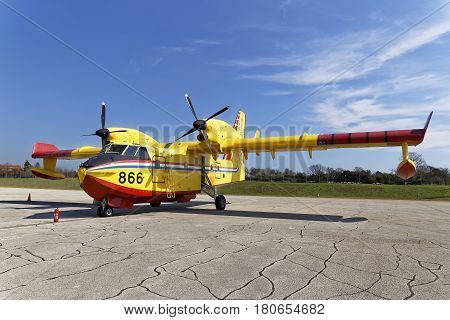 PULA, CROATIA - MARCH 25, 2017: Bombardier CL-415 water bomber aircraft on exhibition in Pula airport during 50. years of anniversary of first commercial flight in Pula