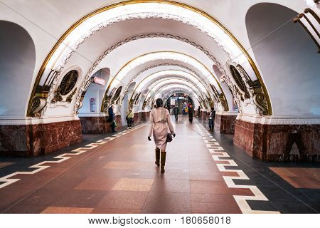 ST PETERSBURG, RUSSIA - MARCH 20, 2017: Inside Ploshchad Vosstaniya metro station - one of the centrally located station in Saint Petersburg, Russia. Illuminated vestibule with unidentified people