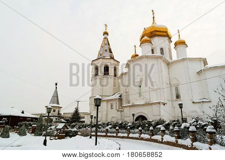 Tyumen, Russia. Holy Trinity monastery in Tyumen, Russia in winter during the cold and cloudy day. Popular landmark in siberian town