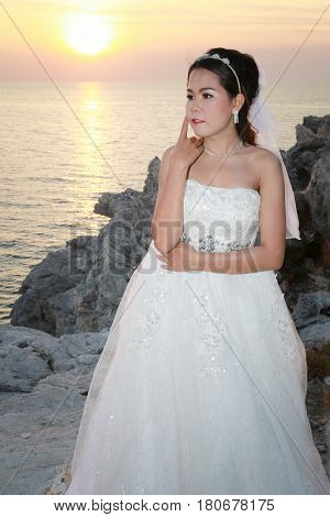Photos Fashion Wedding Dress of Asian women at Si Chang Island Chonburi Province Thailand concept of marriage and beauty.