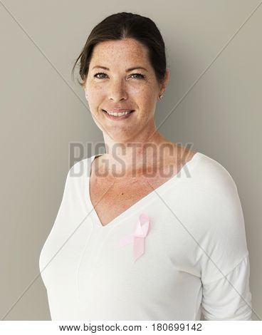 Caucasian Woman with a Pink Breast Cancer Ribbin