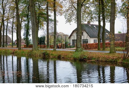 Farms overlooking the moat of the castle Cannenburgh in Vaassen in the Dutch province of Gelderland.