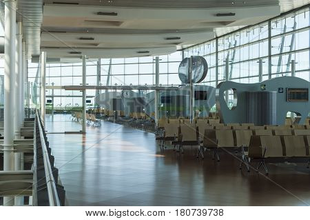 Madrid Spain: 24th July 2016: The Madrid-Barajas Airport is Spain's largest and busiest airport characterised by a floating roof propped by an internal coloured structure.