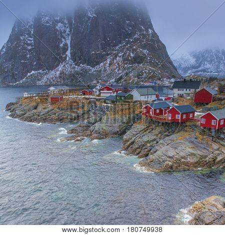 Traditional Norwegian Fishing Hut Village in Hamnoy During Early Spring Time in Lofoten Islands Norway. Square Shot