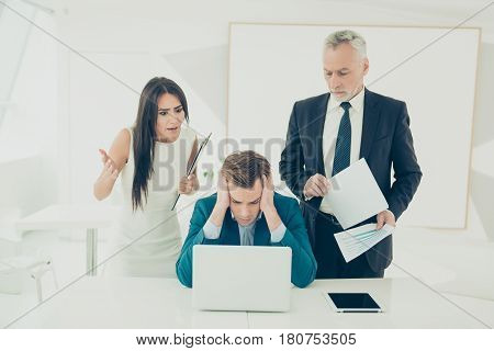 Angry Frustrated Boss Screaming At His Worker For Bad Plan. Angry Tired Businessman In Formal Wear R