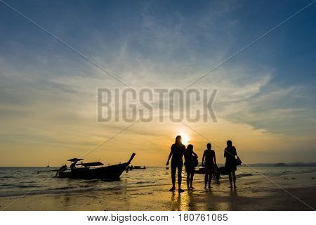 People on the beach in Ao Nang Krabi at sunset