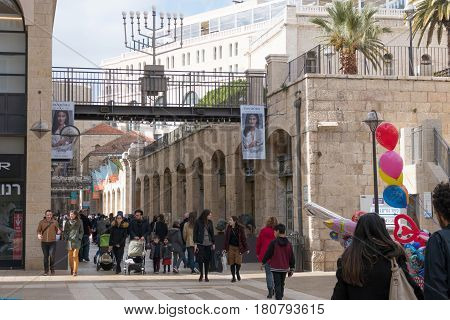 Jerusalem, Israel - December 30, 2016 :  Mamilla shopping street sign. Located by Jaffa gate, Mamilla Avenue, is an upscale shopping street and the only open-air mall in Jerusalem.
