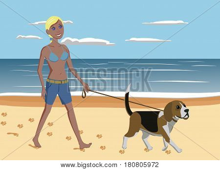 Young woman and dog beagle walking on the beach