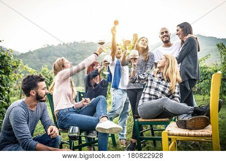 Group of friends at restaurant outdoors - People having dinner in a home garden