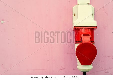 Close-up shot of industrial plug put into socket
