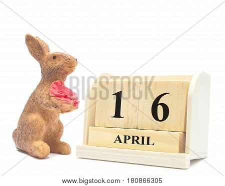 celebrate for easterday 2017 Vintage bunny toy with wood calendar isolated on white background