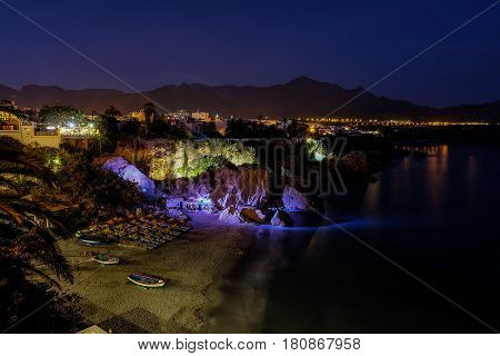 Beautifully Lit up beach at night long exposure
