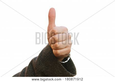 Hand with thumb up view from the front solated on white baskground.