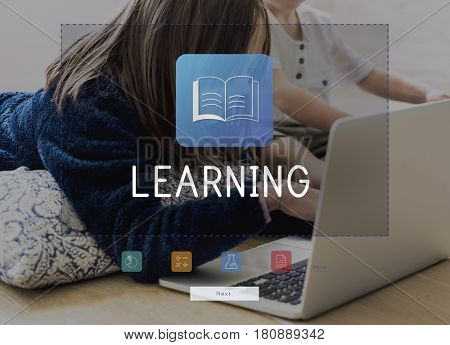 Kids playing games using tablet and laptop