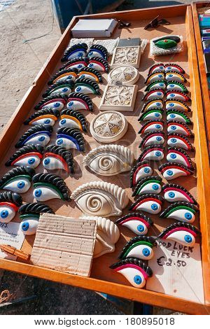 Good luck eyes and Maltese cross traditional souvenirs for tourists on Malta.