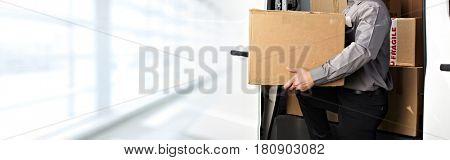 Delivery postman hands with a box