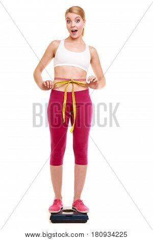 Happy Woman Measuring On Weighing Scale. Weight.