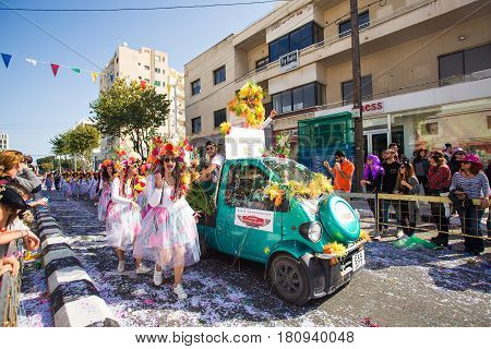 LIMASSOL, CYPRUS - FEBRUARY 26: Grand Carnival Parade - an unidentified people of all ages , gender and nationality in colorful costumes during the street carnival, February 26, 2017 in Limassol, Cyprus.