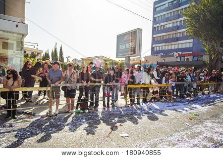 LIMASSOL, CYPRUS - FEBRUARY 26: Grand Carnival Parade - an unidentified people of all ages , gender and nationality in colorful costumes during the street carnival, February 26, 2017 in Limassol, Cyprus.