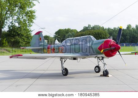 LEEUWARDEN NETHERLANDS - JUNE 10 2016: parked Yak-52 at the dutch air force open days