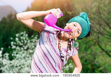 Jala Neti Nasal Irrigation With A Woman Who Practice In Spring Nature