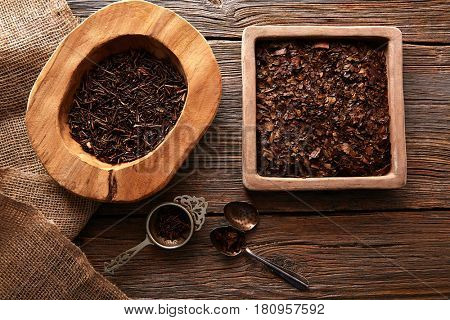 Kukicha and Bancha tea on wooden background table board