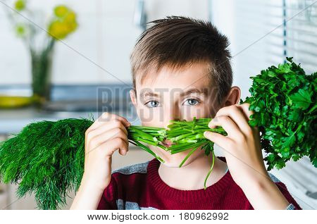 The Child In The Kitchen With Herbs