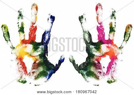 Colorful left and right hands print. Close up of colored gouache hands print on white background