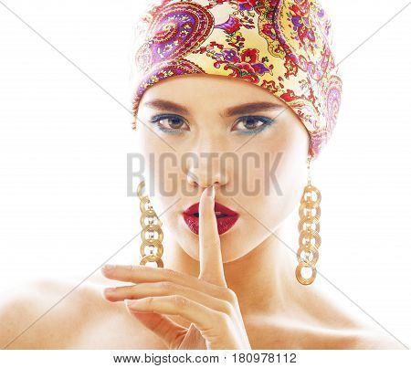 young pretty modern girl with bright shawl on head emotional posing isolated on white background, asian people ethnicity close up
