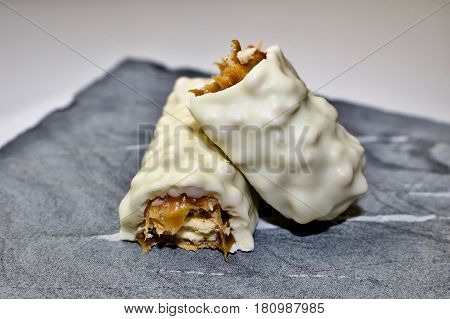 Sweet and long carmel bar in white chocolate