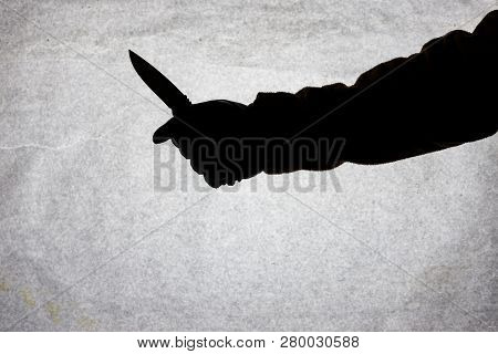 The Knife In The Hand Of Men Who Is Ready To Attack His Victim. Breaking The Law And Crime. Attack W