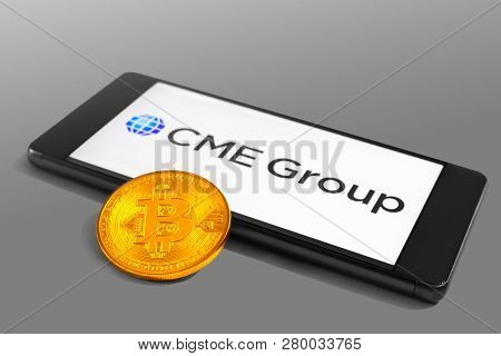 Slovenia - December 16, 2018: Cme Group Logo On A Mobile Device With Bitcoin Coin