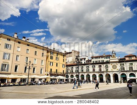 Brescia, Italy - May 15, 2017: The Panorama Of Piazza Della Loggia Square At Sunny Day. Tourism And 