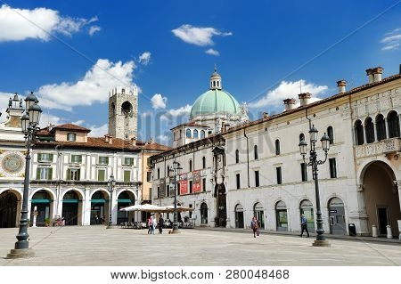Brescia, Italy - May 15, 2017: The Panorama Of Piazza Della Loggia Square At Sunny Day. Tourism And 