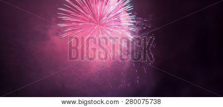 Horizontal Banner With Pink Fireworks And Smoke In Night Skiy