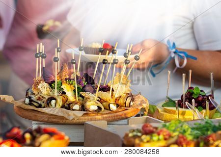 Outdoor Cuisine Culinary Buffet Dinner Catering. Group Of People In All You Can Eat. Dining Food Cel