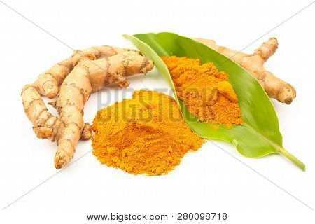 Turmeric Powder And Fresh Turmeric (curcuma) With Green Leaf On White Background. Herbal