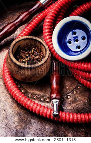 Smoking Hookah With Tobacco