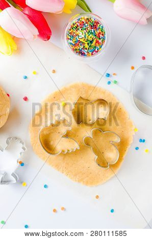 Easter Cooking Background, Dough And Indredients, Cuts For Cookies And Colored Sugar Décor For Bakin