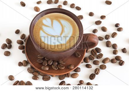 Cup Of Coffee, And Coffee Beans Close Up On A White Background.