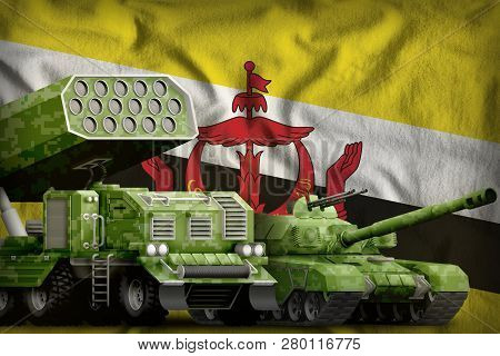Tank And Rocket Launcher With Summer Pixel Camouflage On The Brunei Darussalam Flag Background. Brun