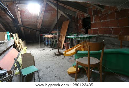 Attic Under The Roof And More Furniture And Many Dust