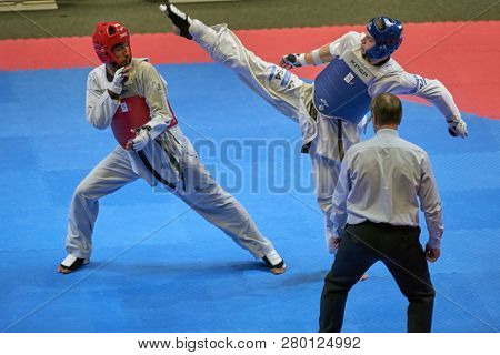 ST. PETERSBURG, RUSSIA - OCTOBER 17, 2015: Taekwondo WTF junior teams match Russia vs Iran during the martial arts festival Baltic Sea Cup in Sibur Arena
