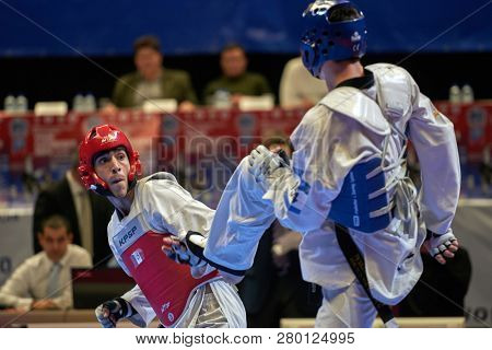 ST. PETERSBURG, RUSSIA - OCTOBER 17, 2015: Taekwondo WTF junior teams match Russia vs Iran during the martial arts festival Baltic Sea Cup in Sibur Arena