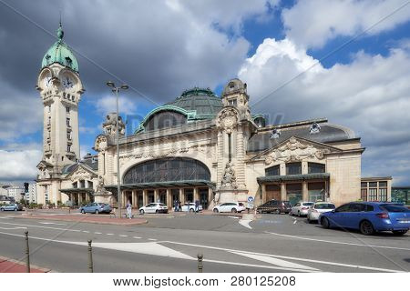 LIMOGES, FRANCE - SEPTEMBER 10, 2013: People at Limoges-Benedictins Train Station in Limoges. Built in 1929, it's considered as one of the most beautiful train station in the world